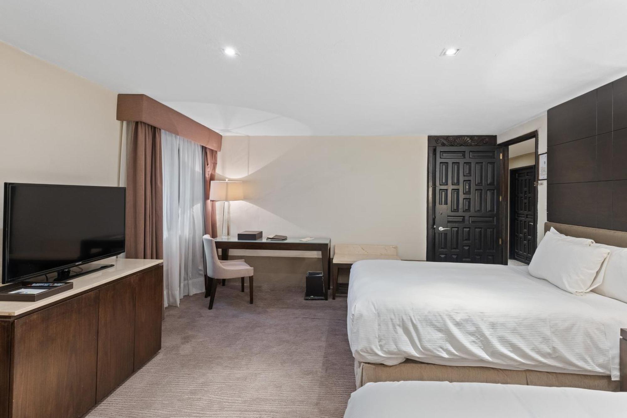 Quinta Real Puebla 호텔 외부 사진 A guest room at the Hilton Garden Inn