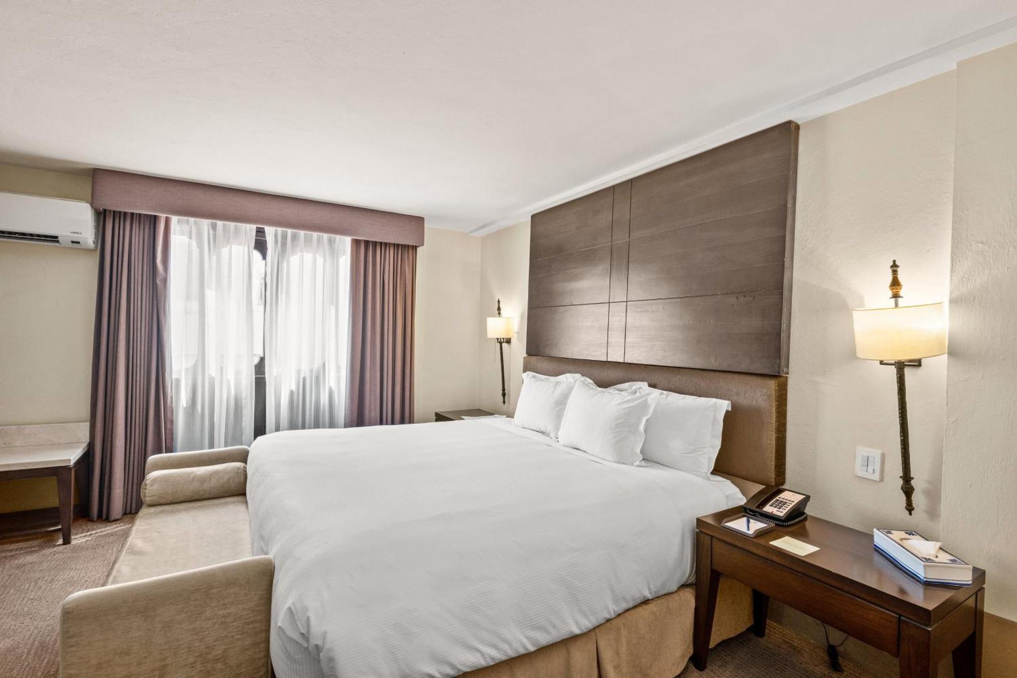 Quinta Real Puebla 호텔 외부 사진 A bedroom at the hotel